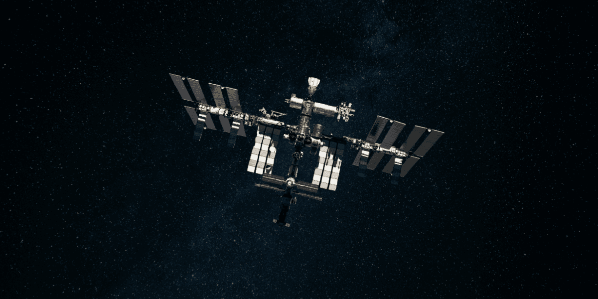 The International Space Station orbiting Earth against a backdrop of stars
